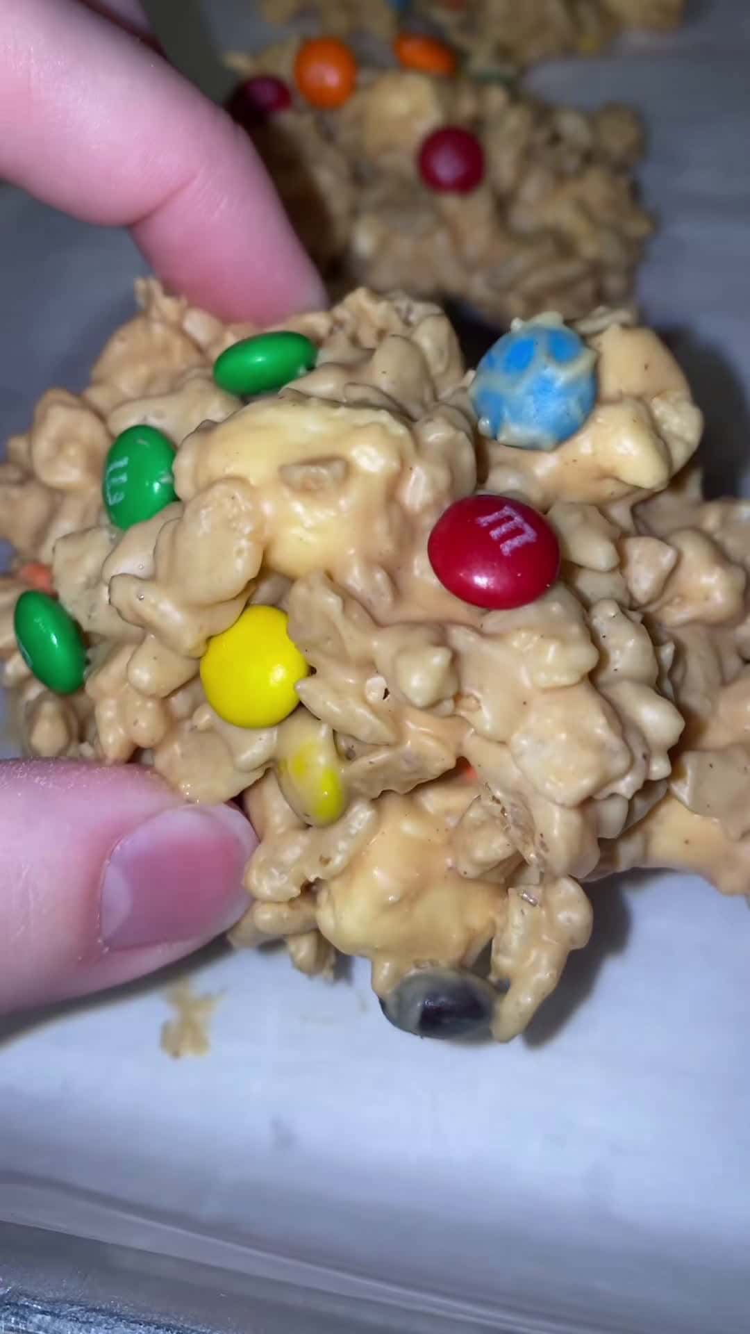 Cover for Episode 18 No Bake Holiday Avalanche cookies! RECIPE: 16 oz almond bark, 3/4 c PB, 1 c m&ms, 1 and 1/2 c mini marshmallows, 3 and 1/2 c rice krispies. Melt chocolate and PB together, add krispies and marshmallows/ m&ms. Drop big spoonfulls onto lined pan and let harden. #avalanchecookies #fyp #nobakecookies #cookietok #cookierecipe #easyrecipe #christmascookies #foryou #desserttiktok #dessertrecipe