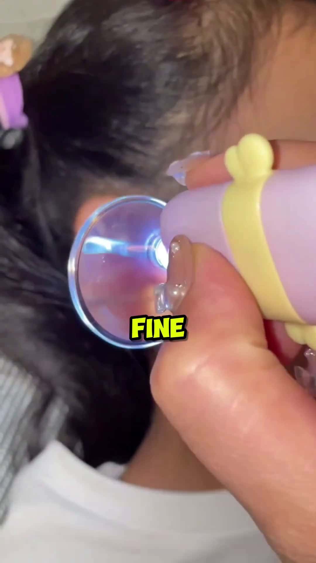 Cover for This girl is showcasing an amazing find that allows you to clean your ears