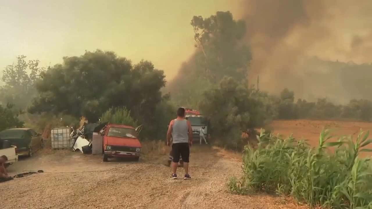 Cover for Greece battles multiple wildfires as strong winds spread flames