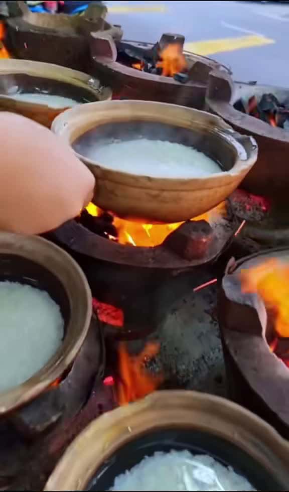 Cover for claypot chicken rice in malaysia. translating to 'rice casserole', the traditional asian dish is enjoyed for its hearty, home-cooked appeal. the claypot is known for giving a unique depth of flavour to the dish. if that tantalised your taste buds, hit the link in bio to find a dining spot near you by checking out our travel guides  #claypotchicken #streetfoodmalaysia #streetfood #food #travel #culture #discoverontiktok