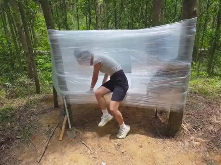 Cover for Build a shelter out of plastic wrap and live alone in the wild. wildbuild 64042 #shortvideos