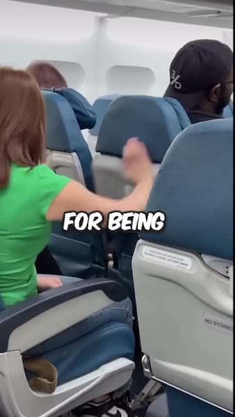 Cover for This Karen totally lost it on a fellow passenger mid-flight, lashing out for no reason! 😤✈️ But what the man did next had the whole cabin laughing! 😂 Did he handle it the right way? You decide! Was she really doing that? 🤔 Watch this insane airplane moment unfold in real-time. Instant karma in the sky! 🌤️