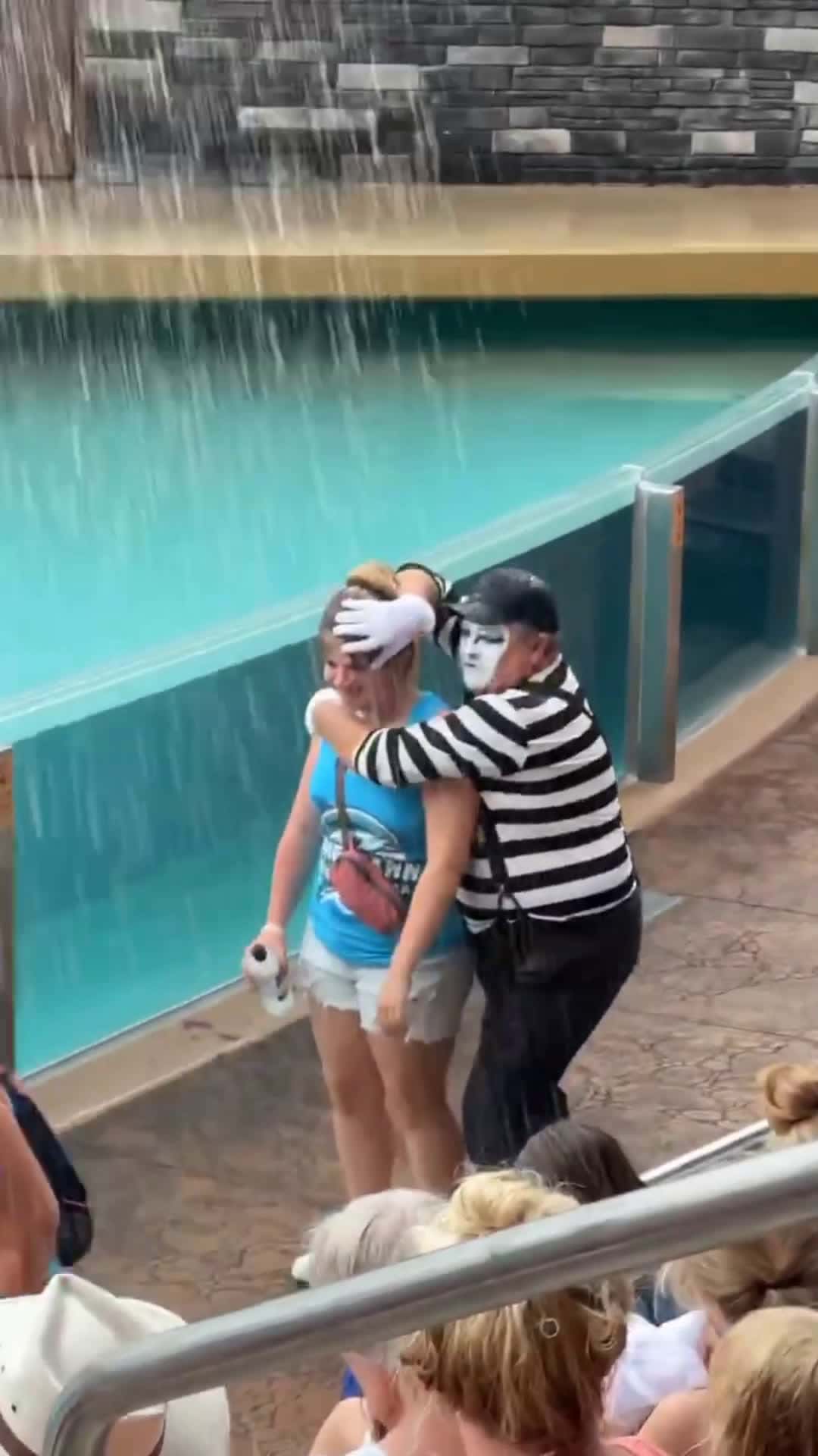 Cover for ‎Aiming to keep her dry😱😂‎#seaworldmime #funny #tomthemime  #seaworldorlando #seaworld #comedy #funnyvideos #fun #mime 