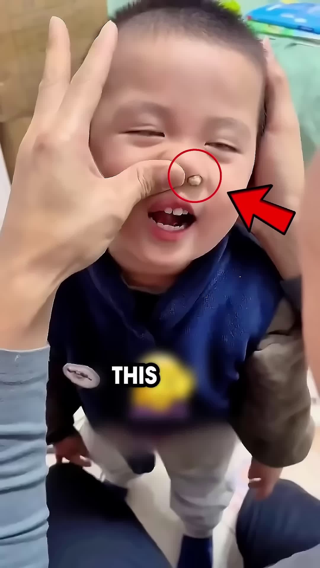 cover for something was stuck in his nose but his dad was there to fix it all