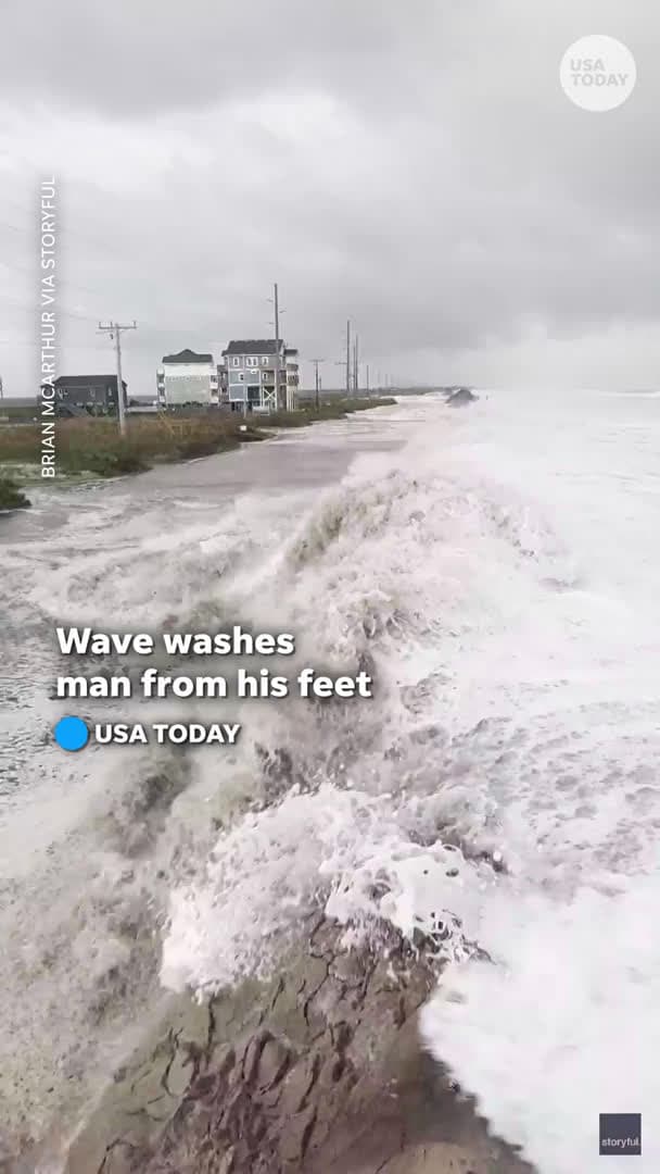cover for Man recording Erin overwash hit by strong wave; see the dramatic moment