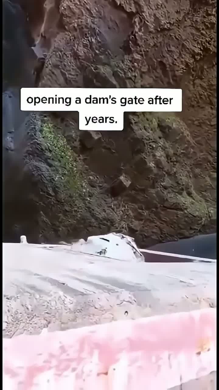 cover for Watch the incredible moment a dam gate, sealed for years, finally opens! 🌊 #DamOpening #WaterRelease #EpicMoment
