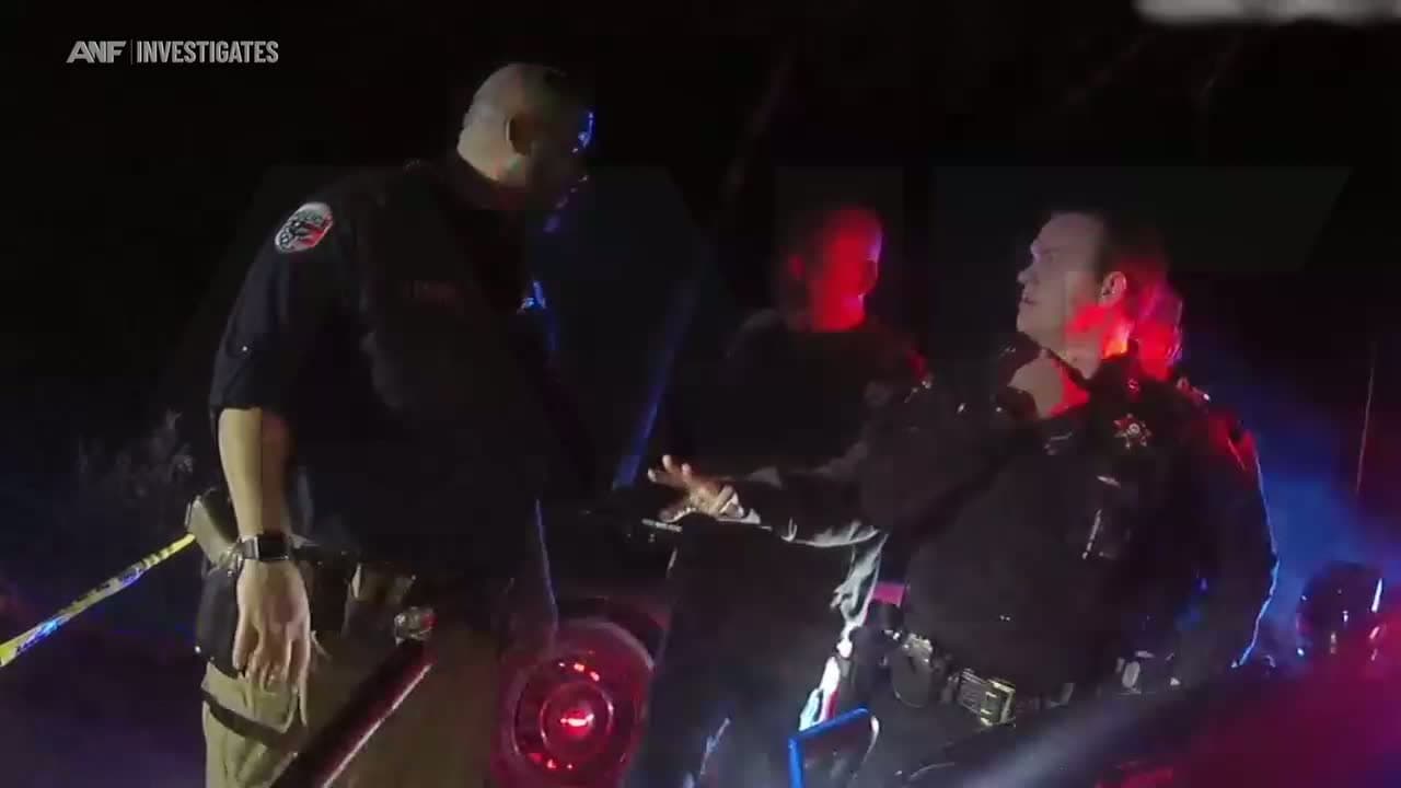 cover for Body camera footage reveals confrontation between sheriff and police officer at shooting scene