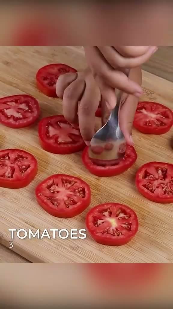 cover for This stuffed tomato is mouth-watering. #stuffedtomato #tomato #deliciousfood #food