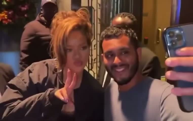 cover for Rihanna cleverly hides her drink before posing with a young fan 🍹✨ #Rihanna #CelebrityMoments #CuteFans