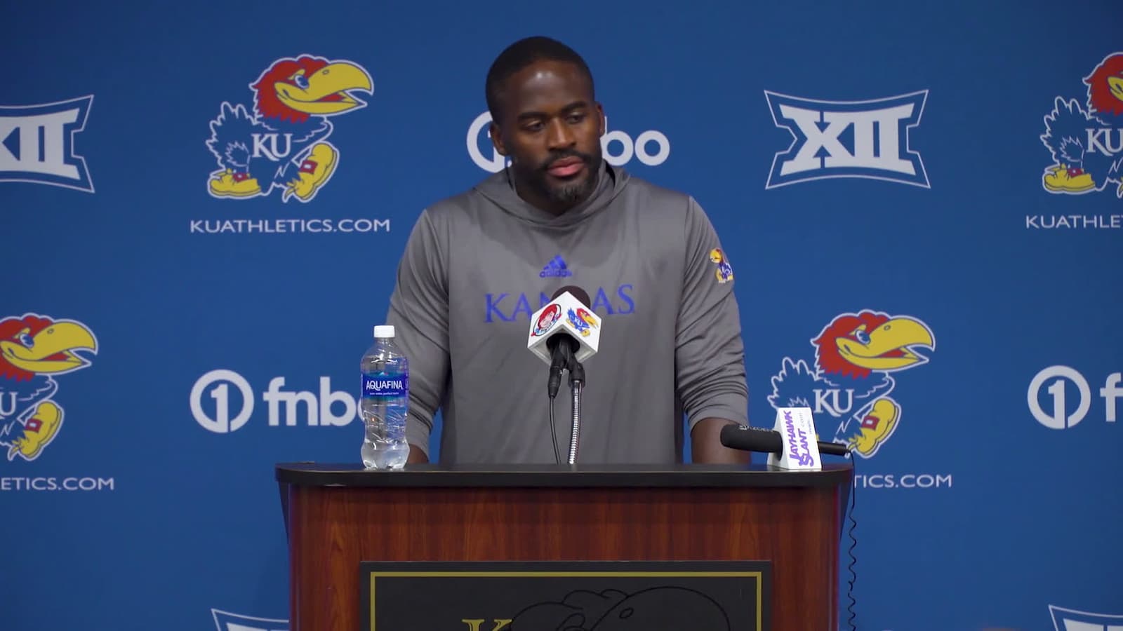 cover for Hear from Kansas football defensive ends coach/special teams coordinator Taiwo Onatolu
