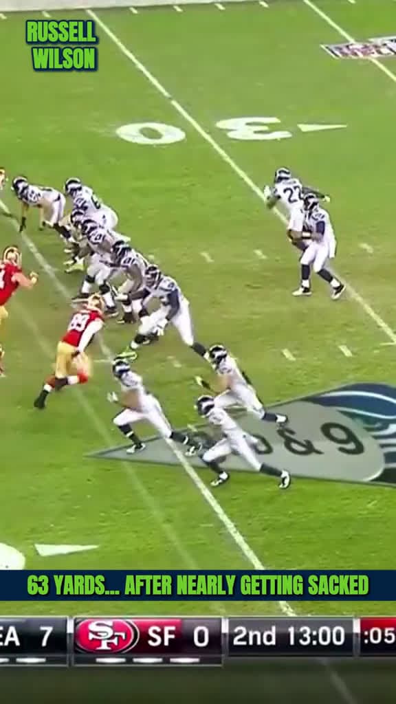 cover for Russell Wilson Escapes Pressure and Finds Tony Moeaki for 63 Yard Gain nflfootbal 55582 #trendingscoopz
