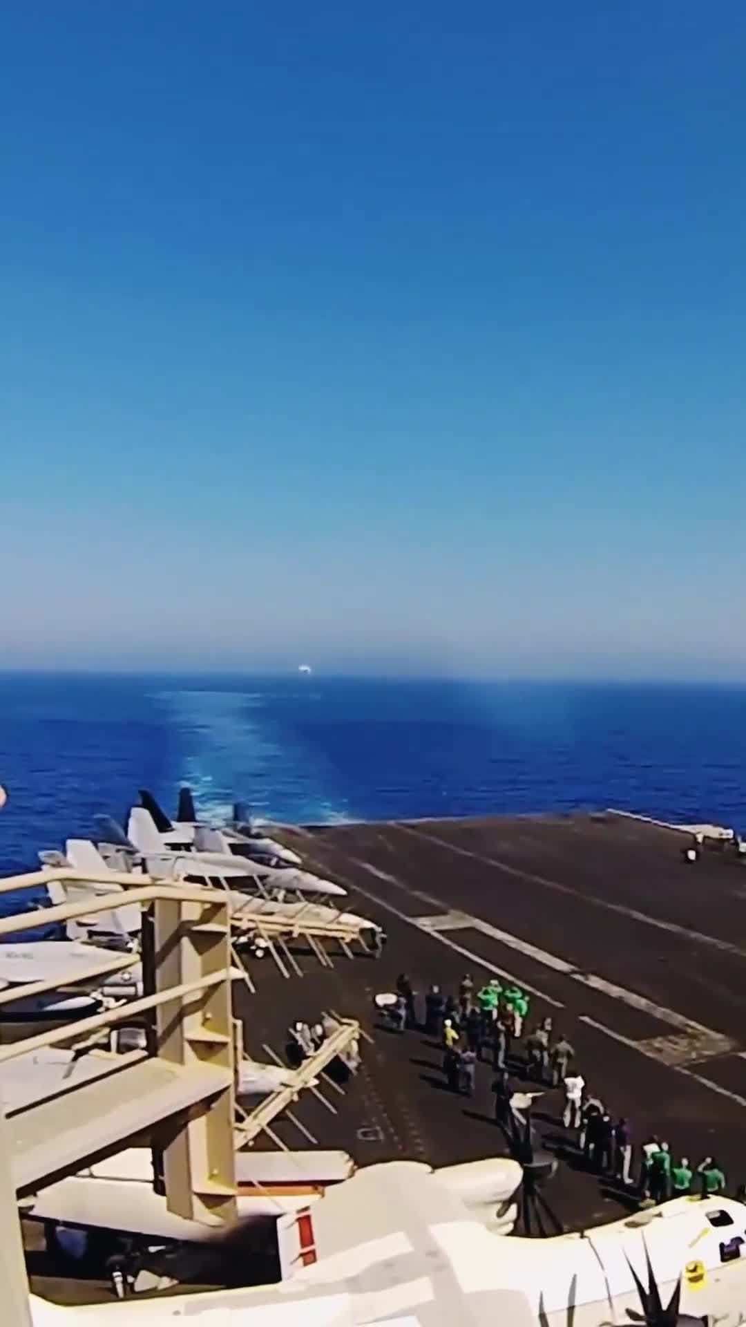 cover for 🤯 F/A-18 Super Hornet flies at supersonic speed past an aircraft carrier                         