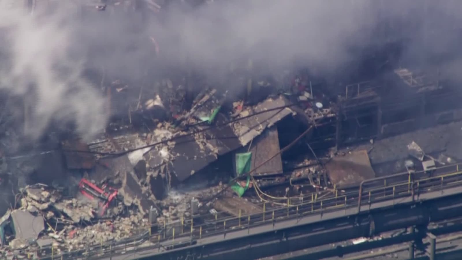 cover for RAW AERIALS: Explosion at US Steel plant in Pennsylvania leaves people trapped