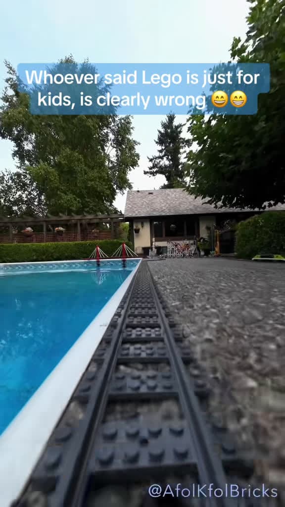 cover for Watch our epic LEGO train loop around the pool and cross a custom-built bridge! 🚂🌊 #LEGO #TrainBuild #CustomBridge