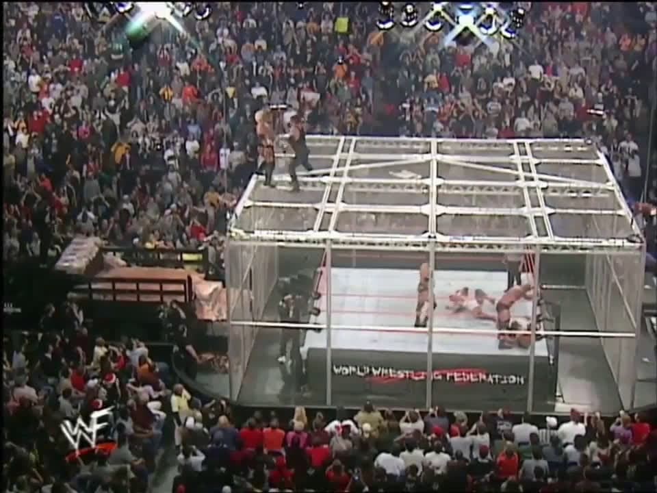 cover for The one and only six-man Hell in a Cell clash at Armageddon 2000 - pure chaos inside the cell 🔥💥 #WWE #Armageddon2000 #HellInACell #SixManMatch