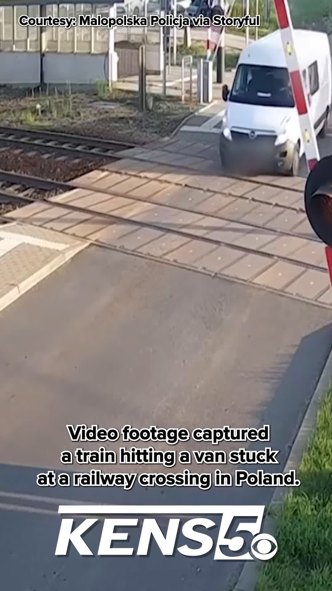 cover for A train struck a van at a railway crossing in Poland
