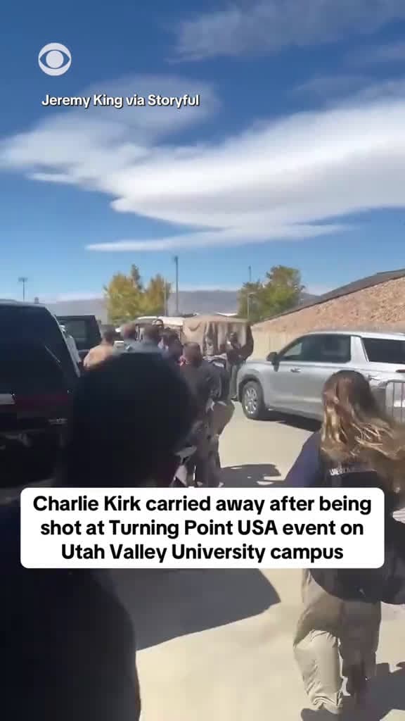 cover for Conservative activist and Turning Point USA co-founderCharlie Kirk seen being carried away after being shot Wednesday at an event at Utah Valley University. Three sources familiar with the investigation said the shooting suspect is apparently still at large. A search is underway. #CaughtOnCamera #TrueCrimeStories