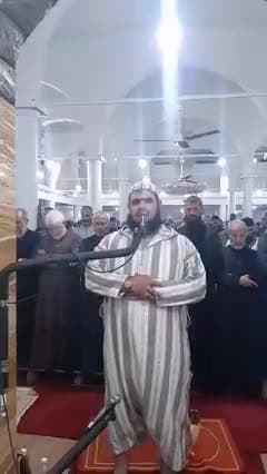 cover for A cat climbs onto the imams shoulder during Tarawih prayers In Islam, cats are considered pure animals There were hadiths from the Sunnah of the Prophet, which indicate its pu