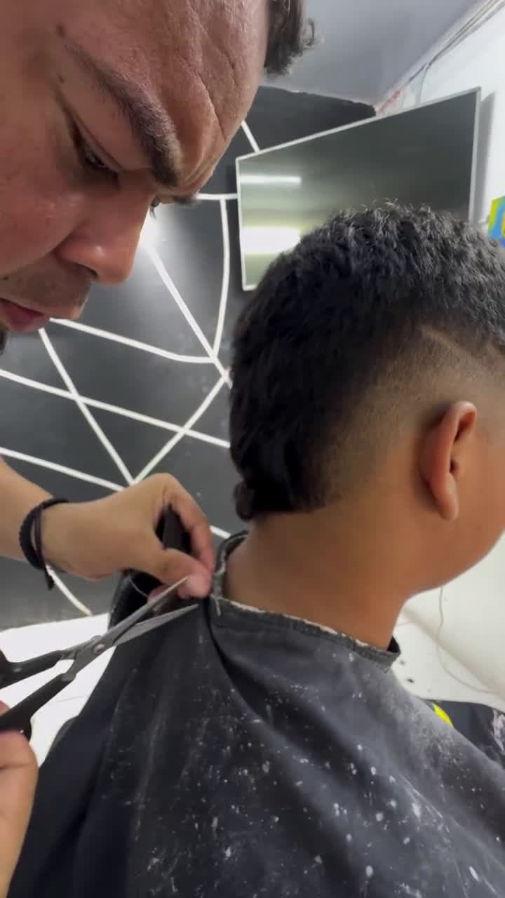 cover for Customer in shock after realising the barber tore his t shirt🤯😂