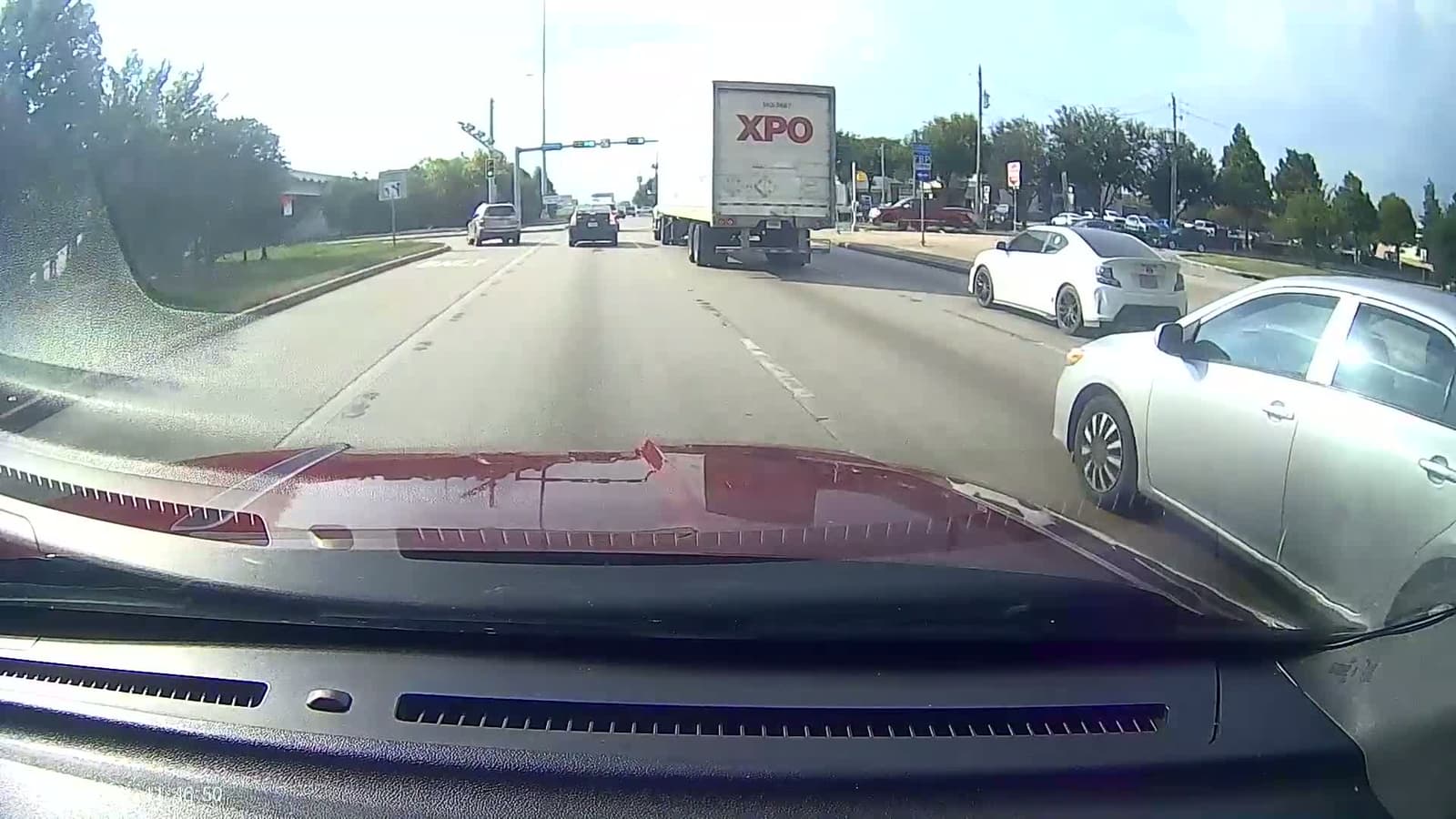 cover for Caught a hilarious driving fail: wrong way U-turn + both lanes stuck at green! 😂 #DrivingFails #TrafficJam #Oops