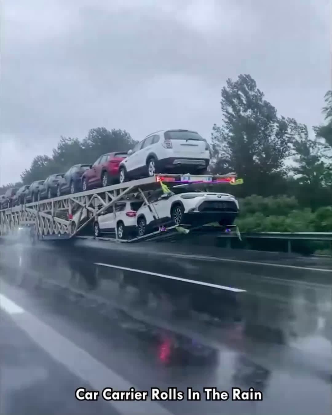 cover for Car Carrier Rolls In The Rain #CarTransport #AutoCarrier #RoadHaulage #RainyDrive #TruckJourney
