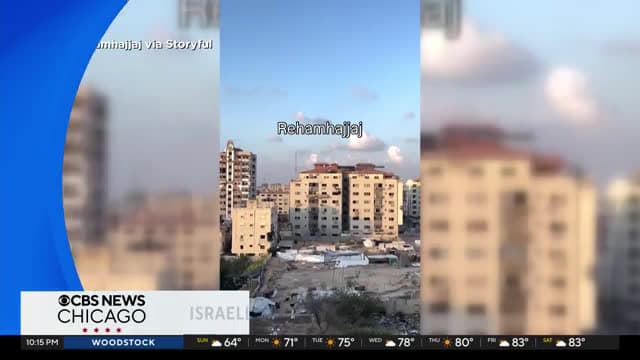 cover for Israel defense forces demolish Al-Roya building in airstrikes in Gaza city