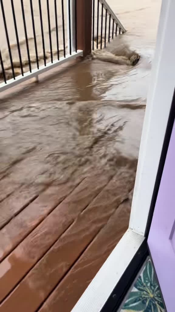 cover for Caught on camera: Just seconds before the flood hit 🚪💧 #HurricaneHelene #FloodWatch #SwannanoaStrong