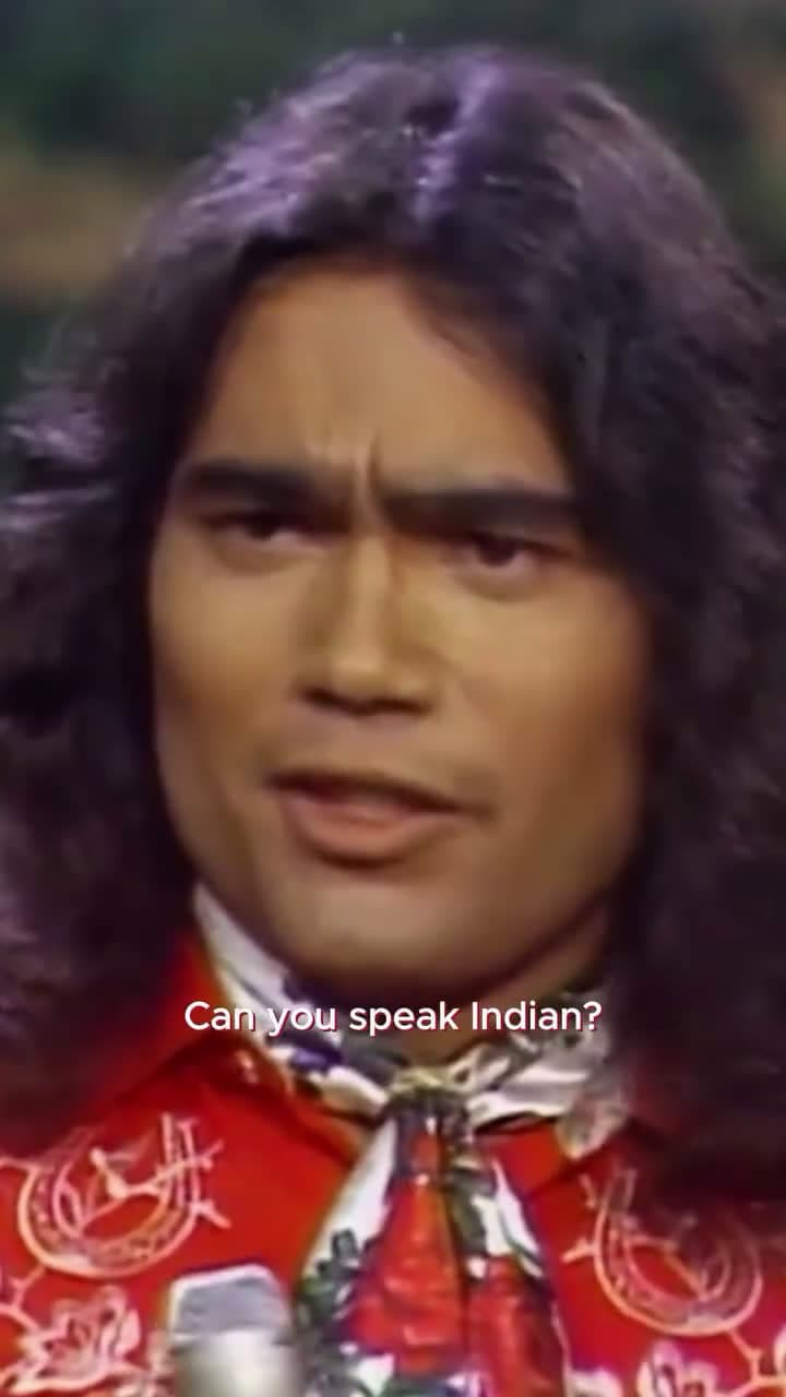cover for The speaker highlights the absurdity of being asked if he can "speak Indian" by comparing it to "speaking Caucasian." He explains the term "Indian" is a misnomer from Christopher Columbus, who mistakenly thought he was in India.