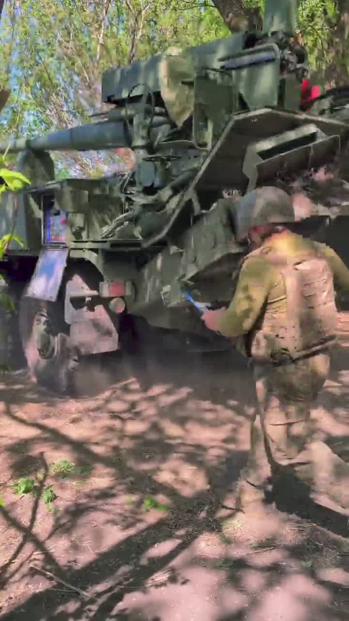 cover for Ukrainian troops unleash the power of Bogdana self-propelled artillery in action! 💥 #Ukraine #Artillery #MilitaryTech