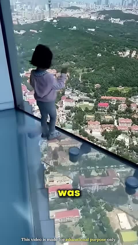 cover for Girl Narrowly Escapes Falling From A Glass Bridge