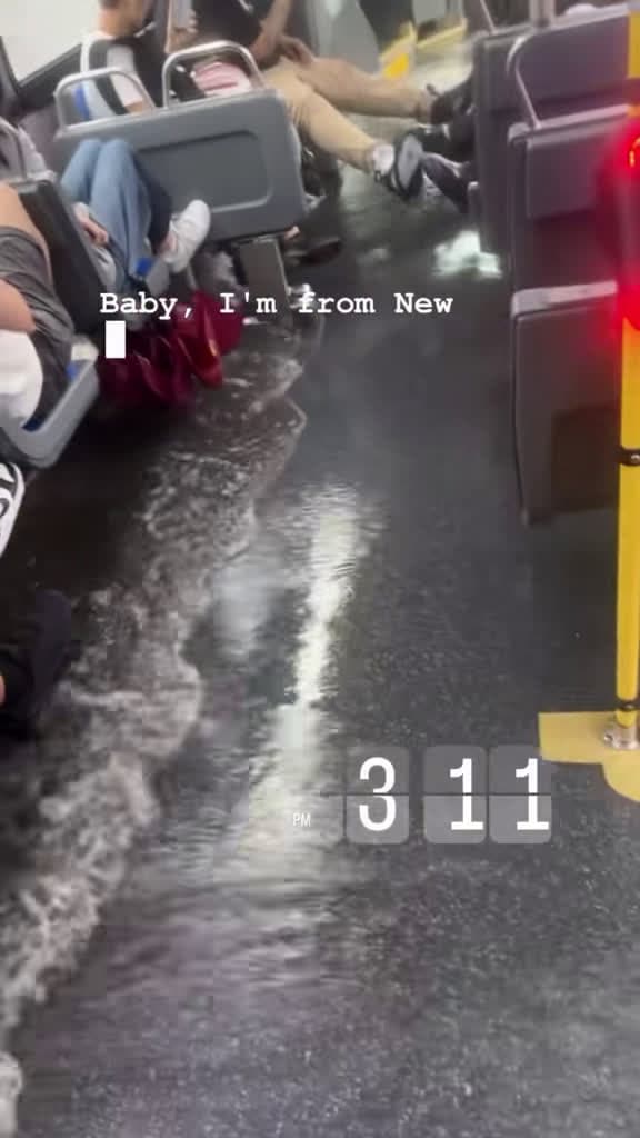 cover for NYC bus turns into a swimming pool! 😳 #flashflood #nyc #busride #viral