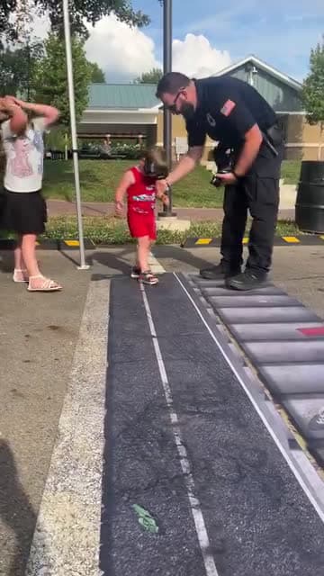 cover for 3-year-old Kade Counts of Circleville tested his simulated drunken walking abilities at National Night Out Tuesday, August 5.#UnpopularOpinion #CaughtOnCamera