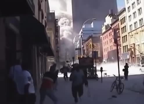cover for Shop owner rushes to shield a woman from the debris cloud during 9/11 💪 #911 #NeverForget #Hero #Rescue