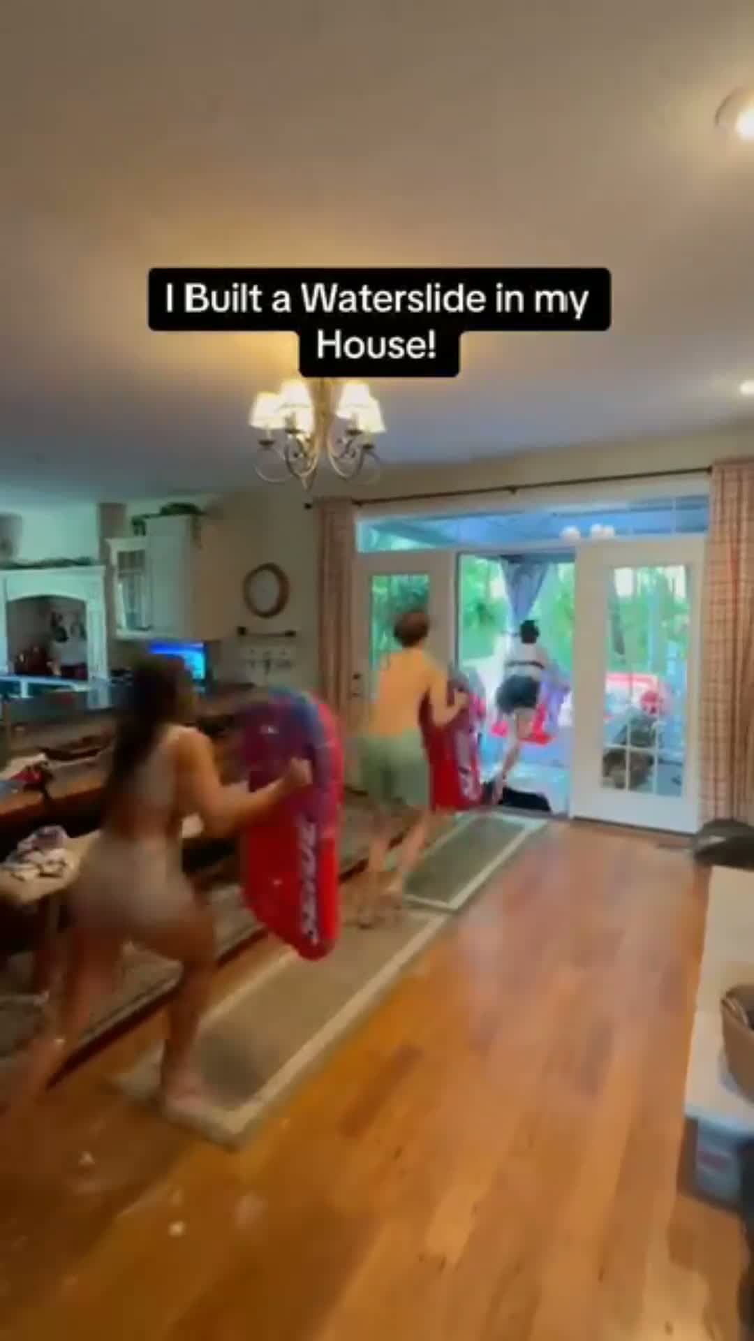cover for Someone built a waterslide in their house. 