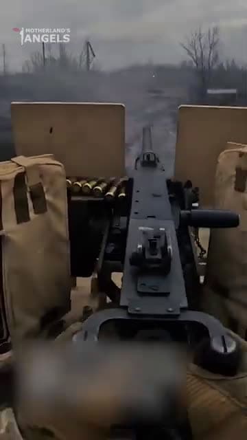 cover for Ukraine soldier firing at Russian positions ukraine shorts
