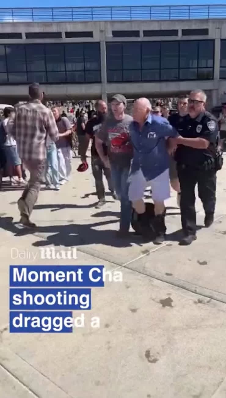 cover for Moment Charlie Kirk shooting suspect is seen being dragged away by police after arrest.