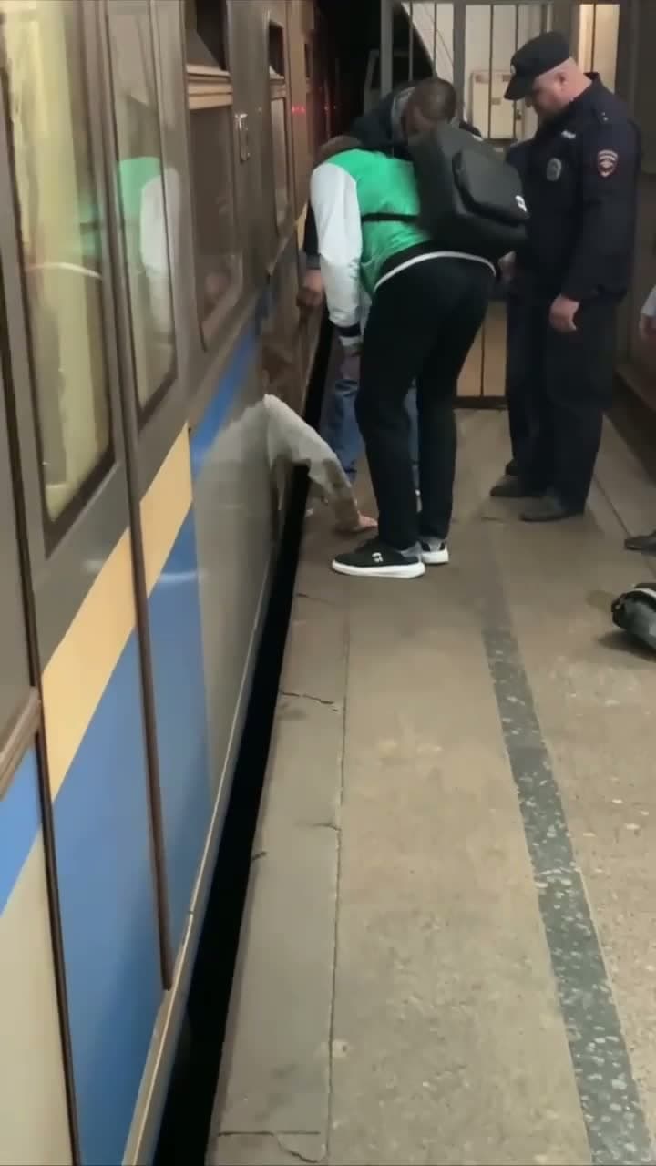 cover for Terrifying moment a man falls onto the train tracks! 😱 #TrainTracks #CloseCall #MustWatch
