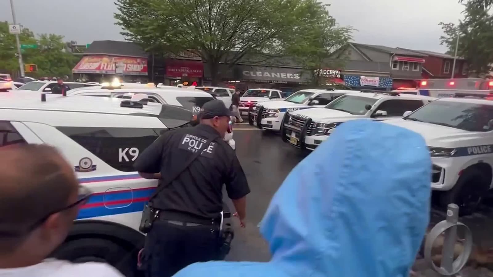 cover for Suffolk police K-9 attacks bystander at funeral for slain NYPD detective