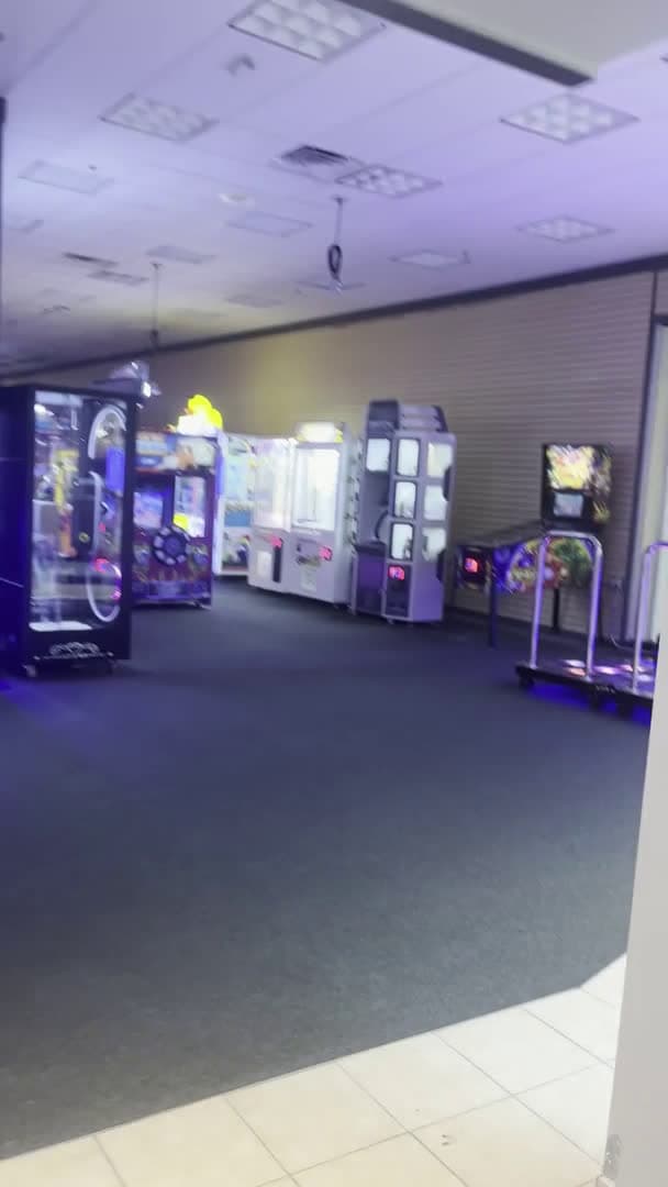 cover for Take a walk around Extravaganza, an arcade inside Independence Mall in Wilmington