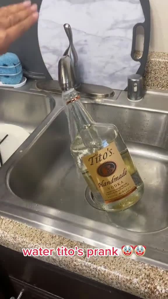 cover for Friend pulls April Fools prank with water in the Titos bottle