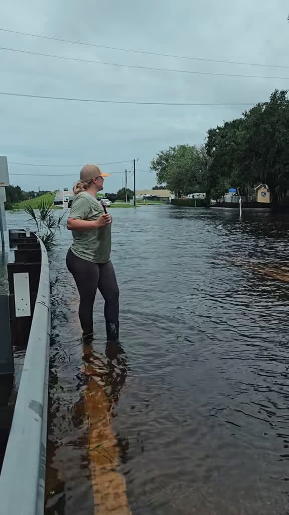 cover for Reporting live from Hurricane Debby! Fishing or flooding? You decide 🌊 #HurricaneDebby #StormWatch #FunnyMoment