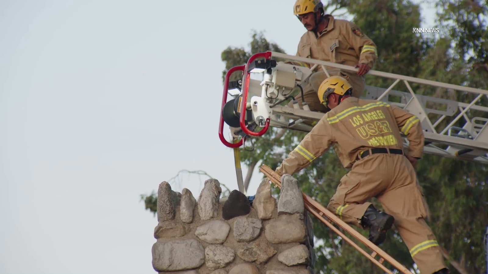 cover for Firefighters Free Woman Trapped Inside Chimney in San Fernando