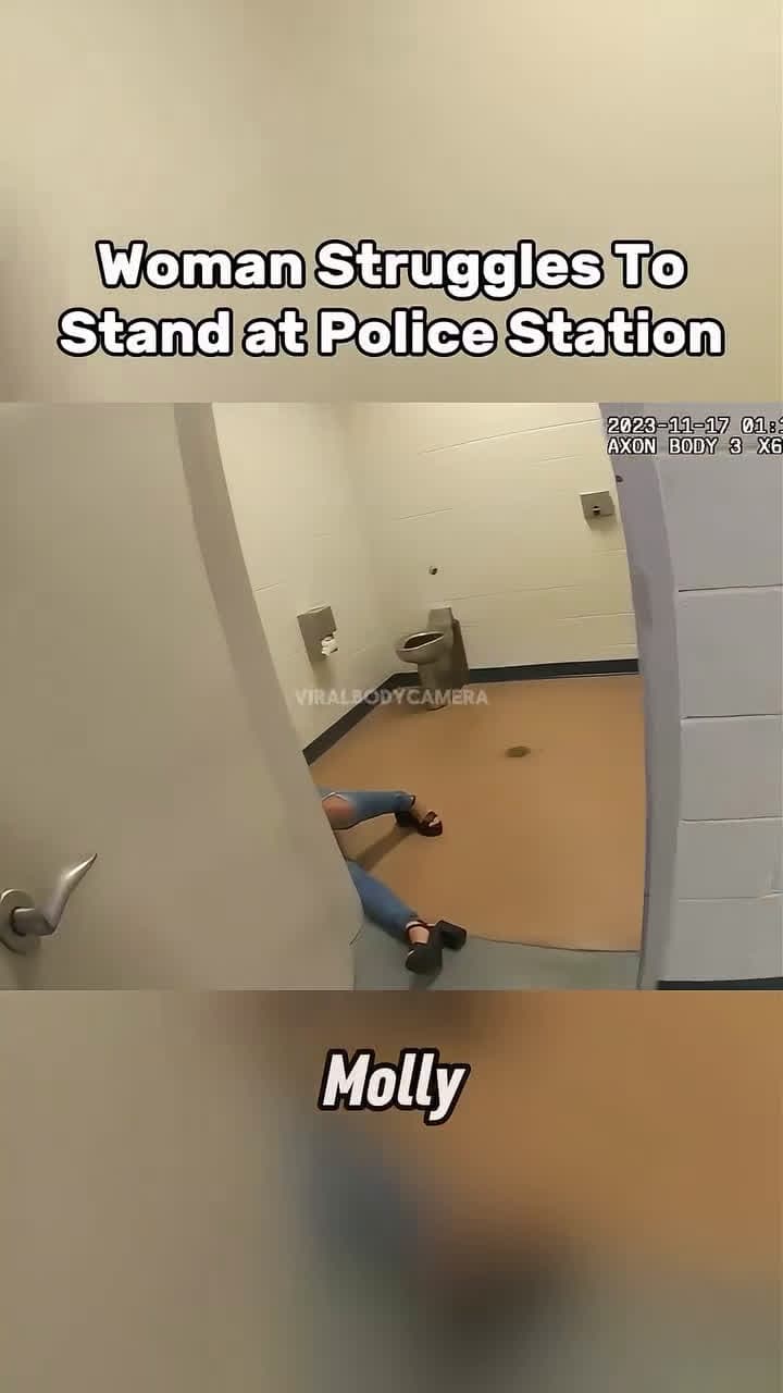 cover for #CaughtOnCamera As officers try to process her, she keeps losing her balance and can barely hold herself up.