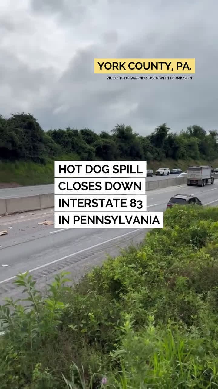 cover for In this video provided by reader Todd Wagner, a crash involving a tractor-trailer and another vehicle closed down Interstate 83 in York County, Pennsylvania, after 1,000 lbs of frozen hot dogs spilled across the road