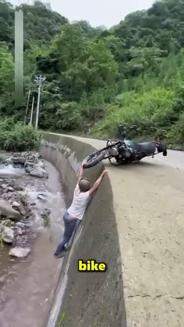cover for This Man Nearly Fell Into The River After Falling Off His Bike