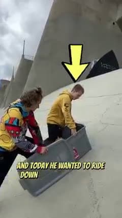 cover for SLIDING DOWN A DAM IN A BIN!