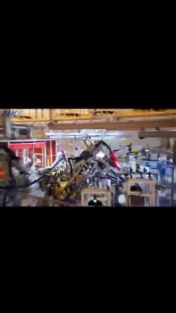 cover for Multiple ABB robots automated in BIW equipped with our designed fixtures safety fence and cable packs etc wwwnkfautomationcomNKF Intelligent