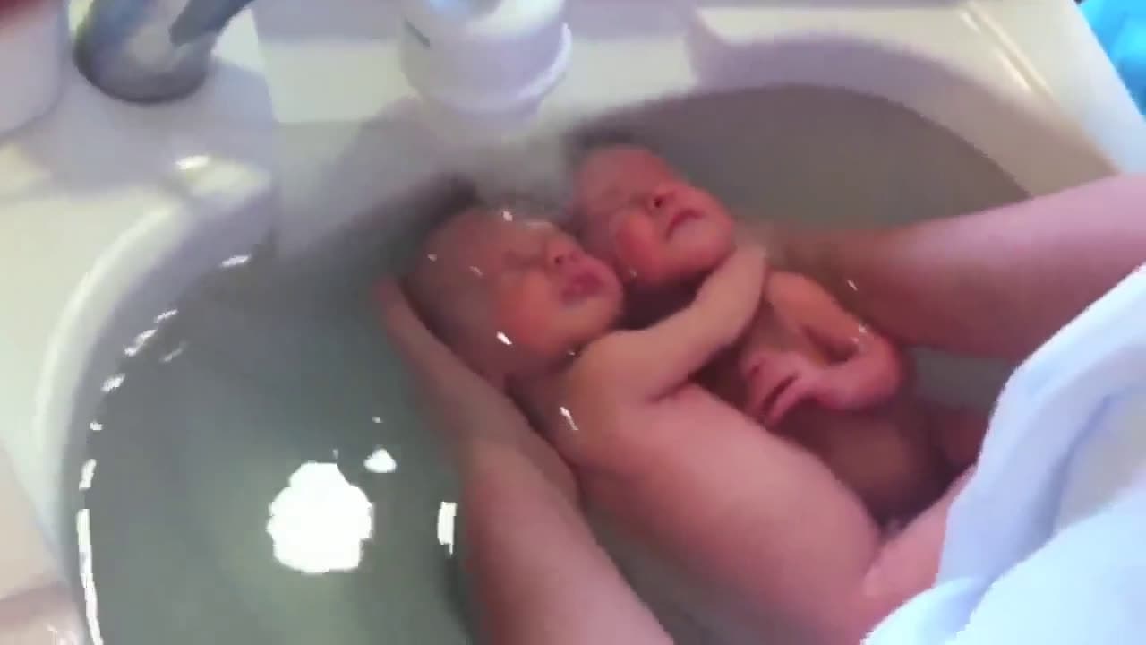 cover for Newborn twins think they're still in the womb. 💕 #CaughtOnCamera