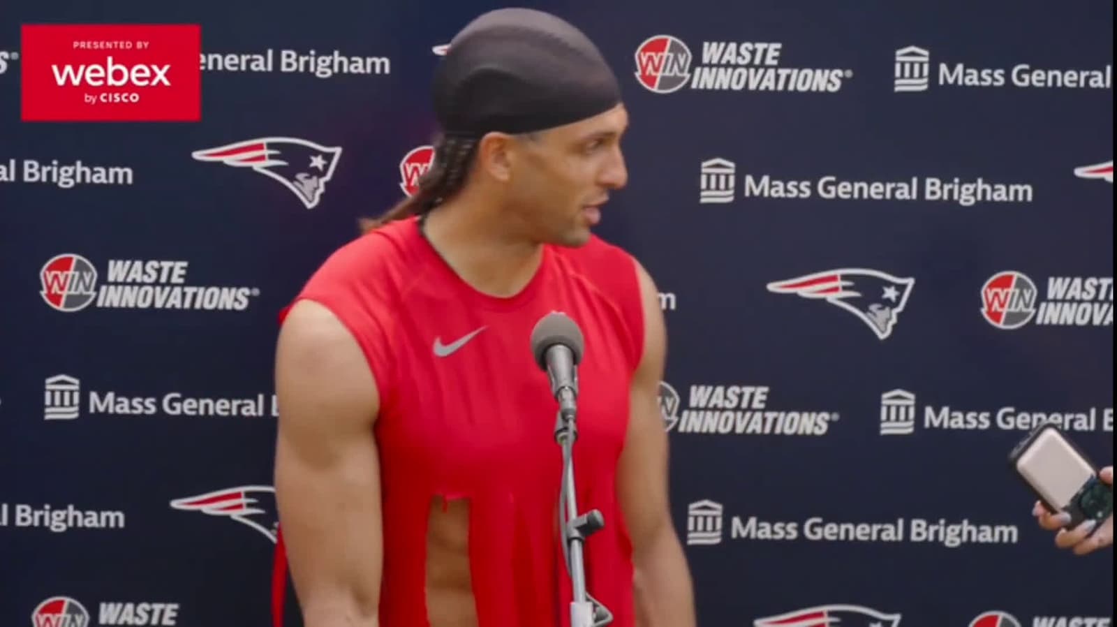 cover for Mack Hollins explains why his torn shirt at training camp makes perfect sense! 💪 #NFL #SportsFashion #TrainingCamp