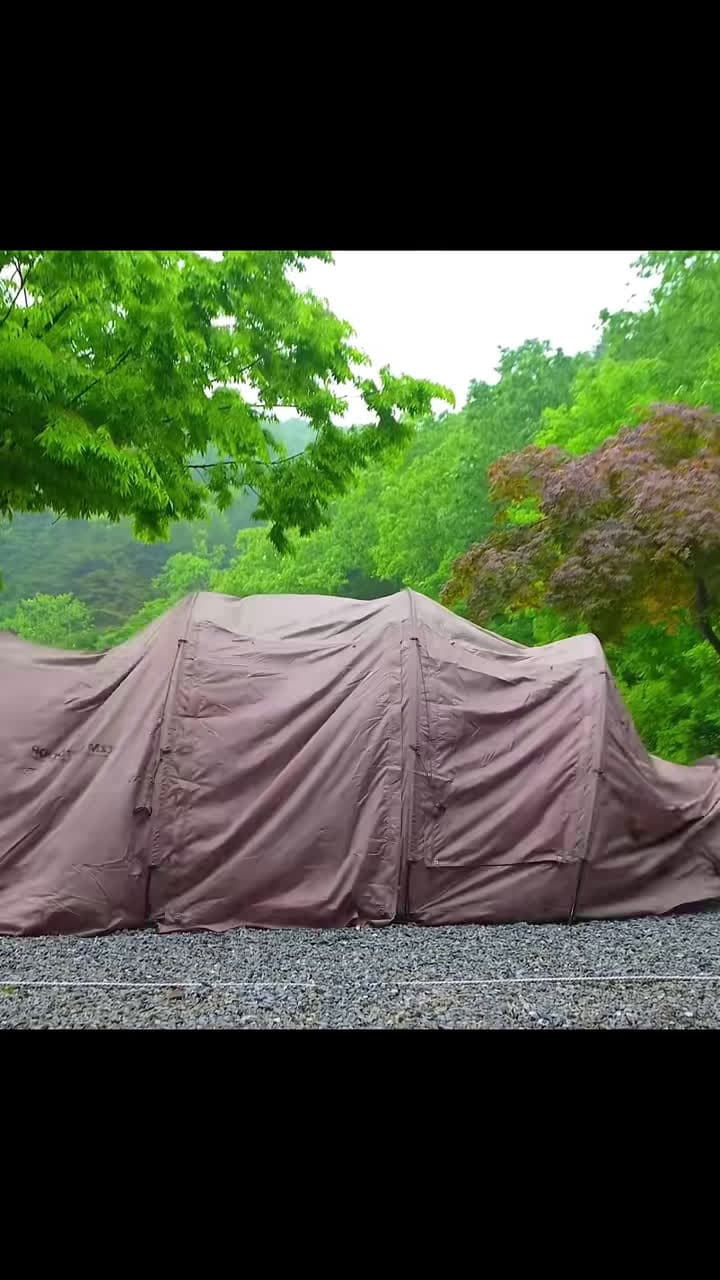 cover for Resting in a 6m long tent in heavy rain that seemed like it would burst through the tentrain car forest survivalskills camp shelter camping bushcraft 